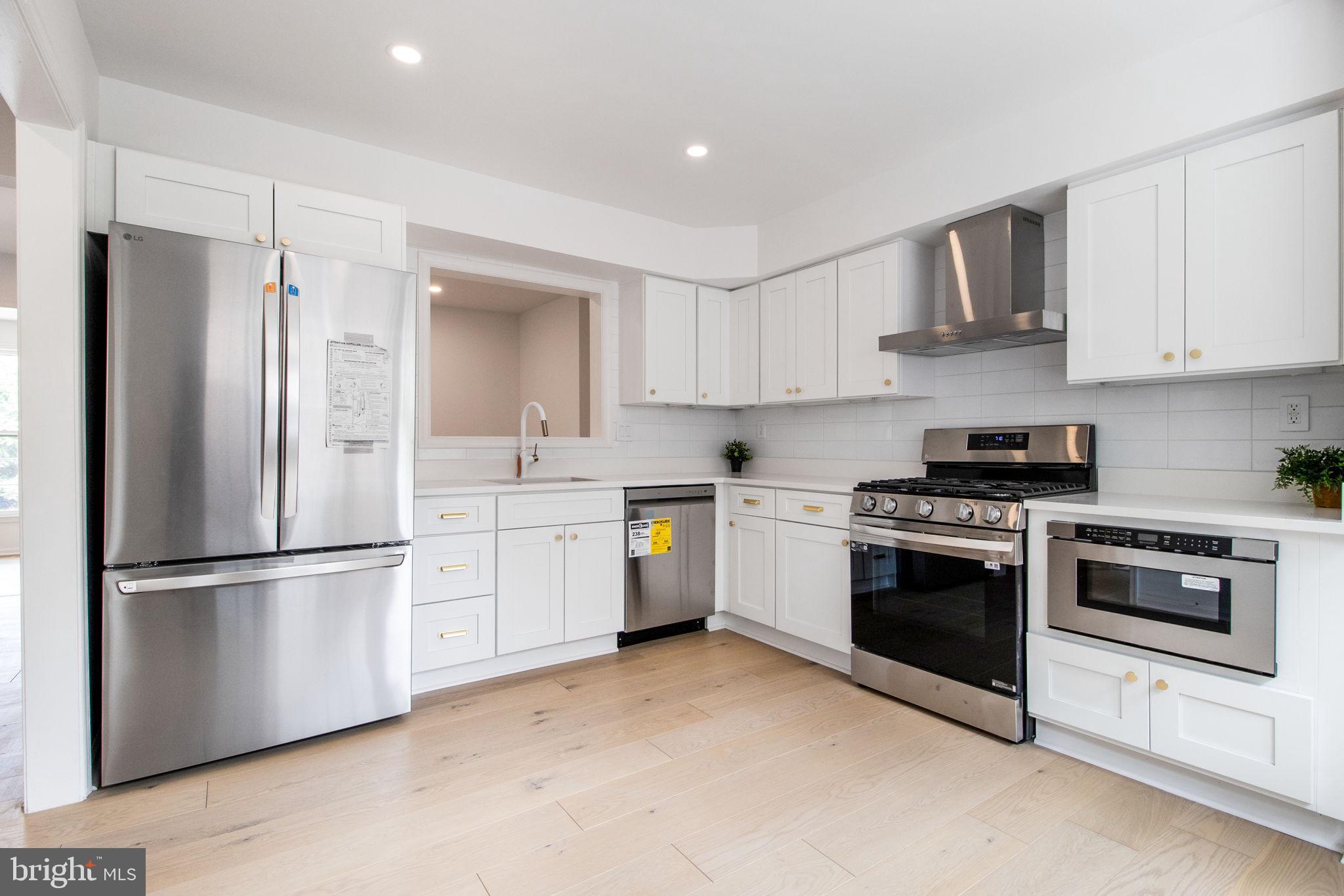 9049 Ottawa Place Silver Spring, MD 20910 - Photo 11 of 89 New appliances