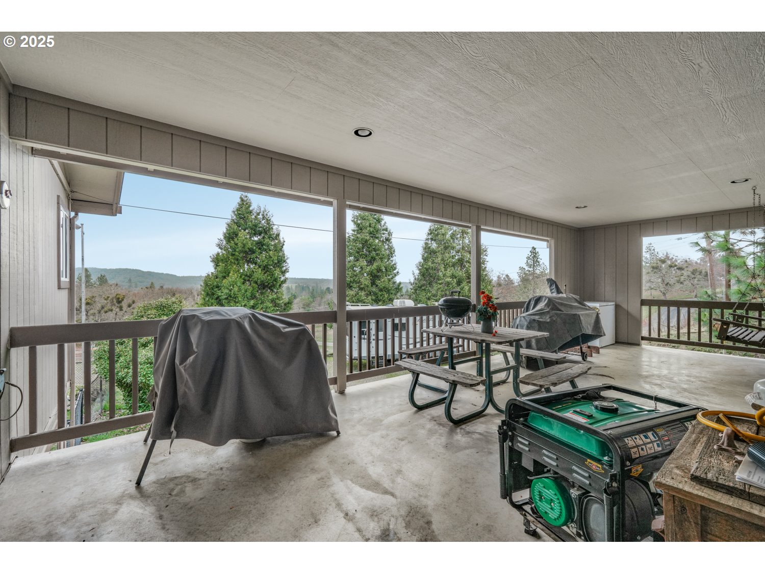 4644 Glen Echo Way Central Point, OR 97502 - Photo 29 of 42 a living room with furniture and a large window