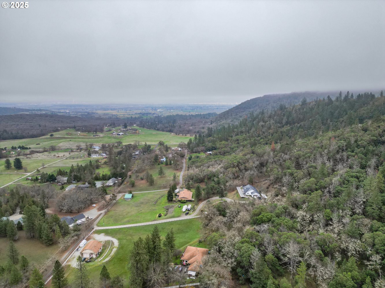 4644 Glen Echo Way Central Point, OR 97502 - Photo 3 of 42 an aerial view of a city with lots of residential buildings