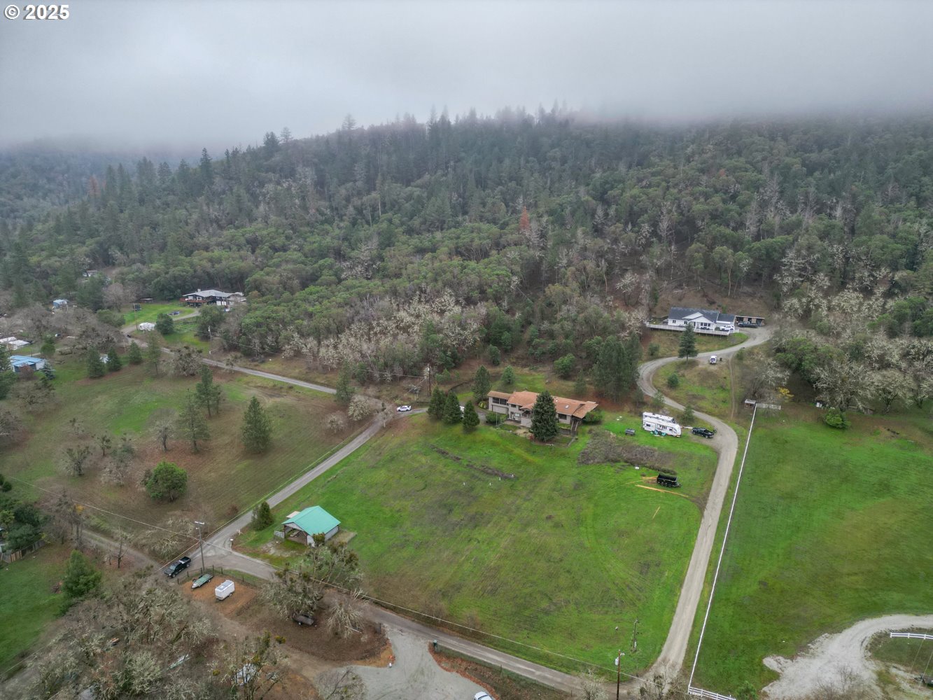 4644 Glen Echo Way Central Point, OR 97502 - Photo 32 of 42 a view of a lake with a yard