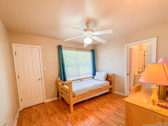 a view of a bedroom from a hallway