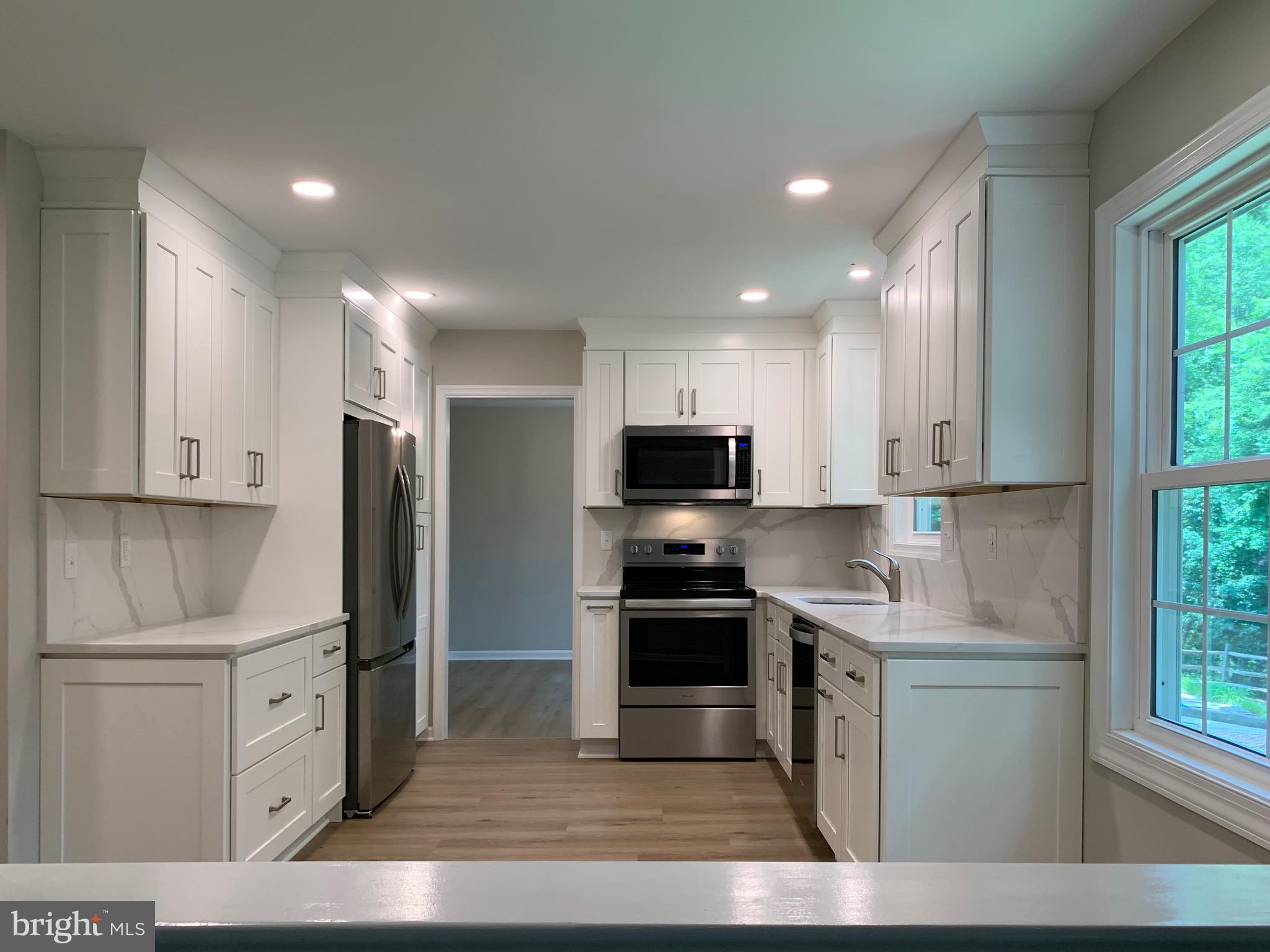 117 Midway Road Phoenixville, PA 19460 - Photo 17 of 49 FamRm View/Kitchen