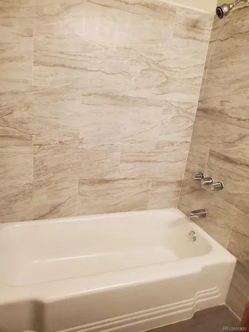 a bathroom with a bathtub