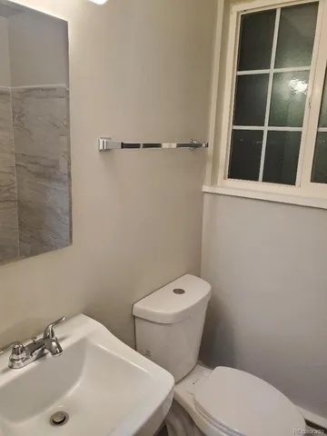 a bathroom with a sink and a toilet