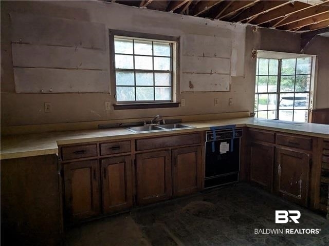 3817 Lansdowne Circle Mobile, AL 36693 - Photo 6 of 16 Kitchen featuring a healthy amount of sunlight and sink