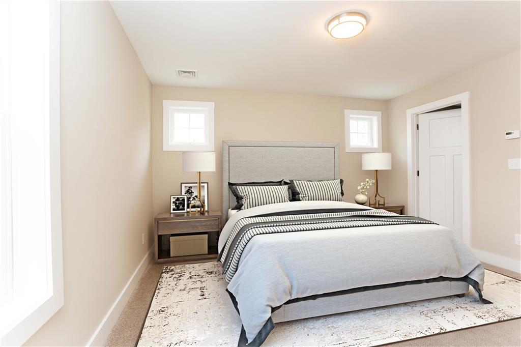 320 Wire Road Wells, ME 04090 - Photo 18 of 35 The master suite runs the width of...