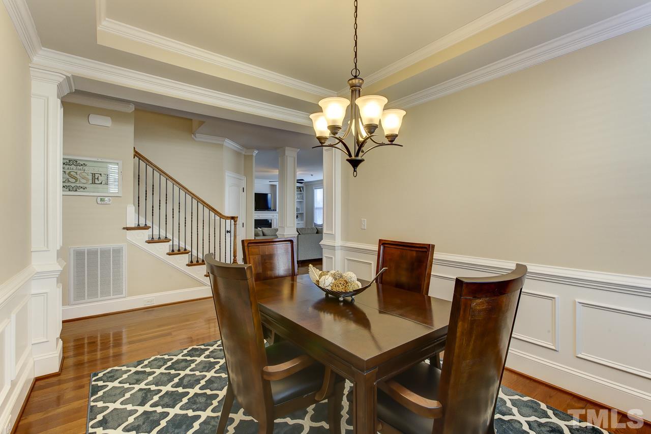 7319 Litchford Road Raleigh, NC 27615 - Photo 9 of 25 a view of a dining room with furniture and wooden floor