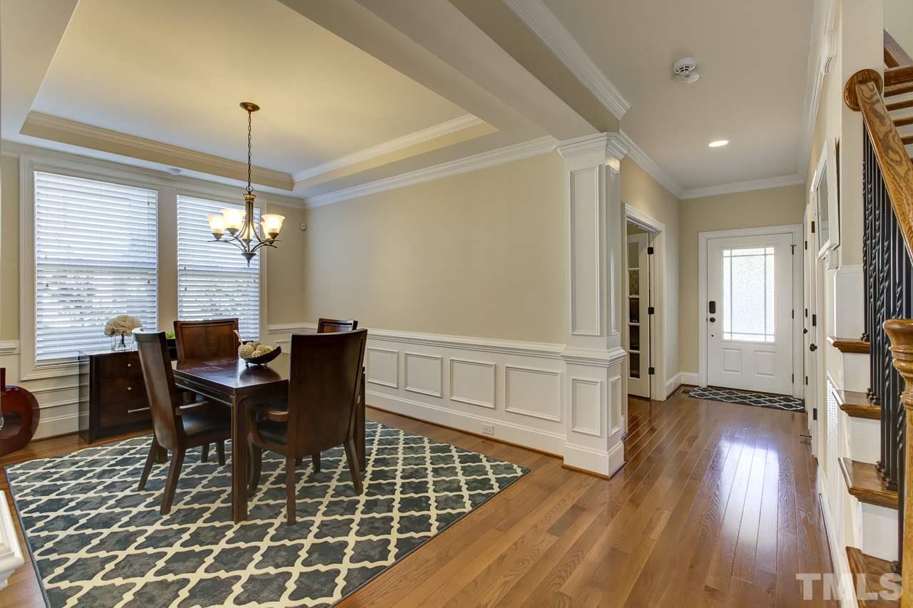 7319 Litchford Road Raleigh, NC 27615 - Photo 10 of 25 a view of a dining room with furniture window and wooden floor