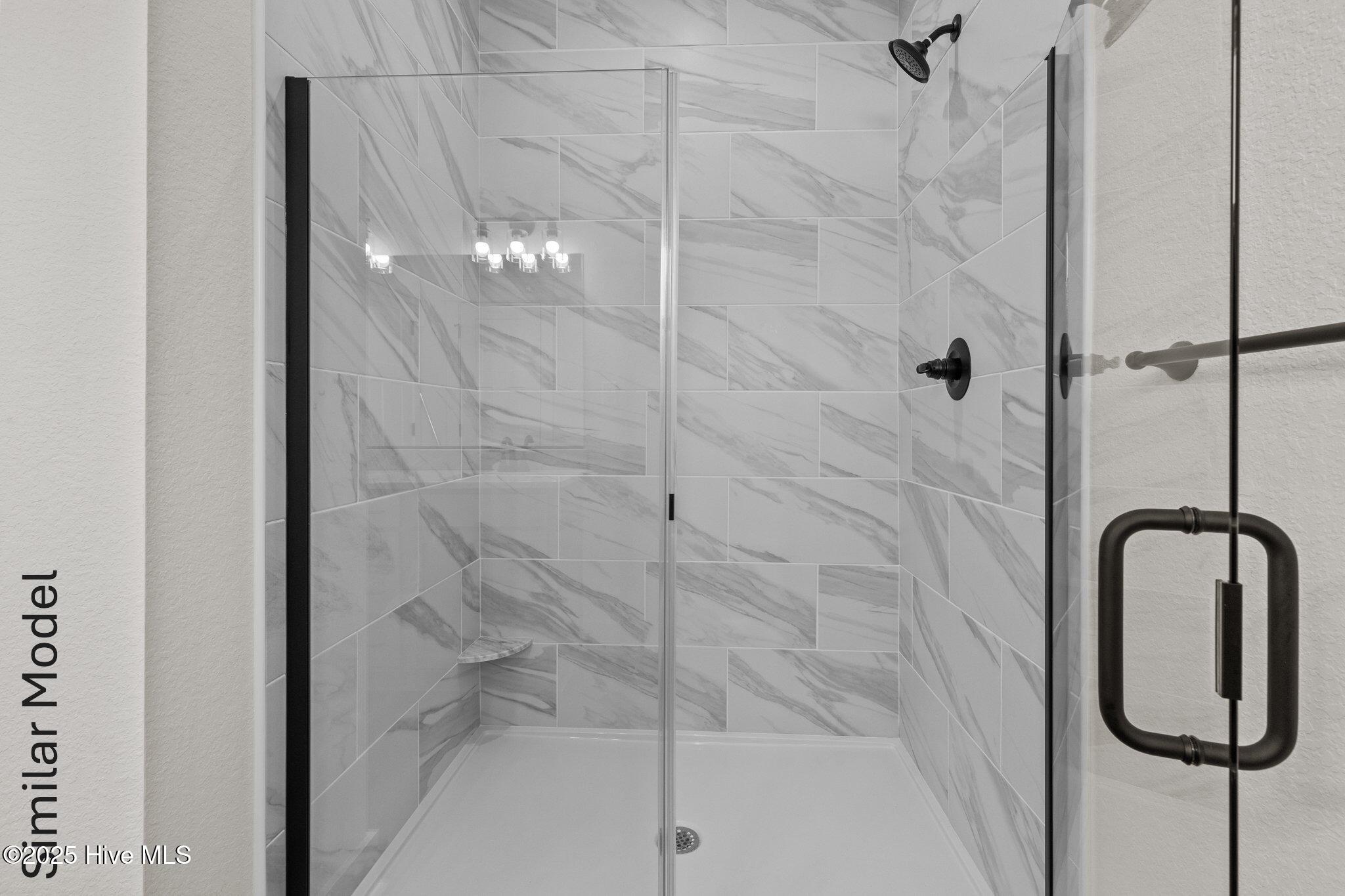 112 Howard Street Camden, NC 27921 - Photo 12 of 17 Primary bath. similar model. colors might vary.