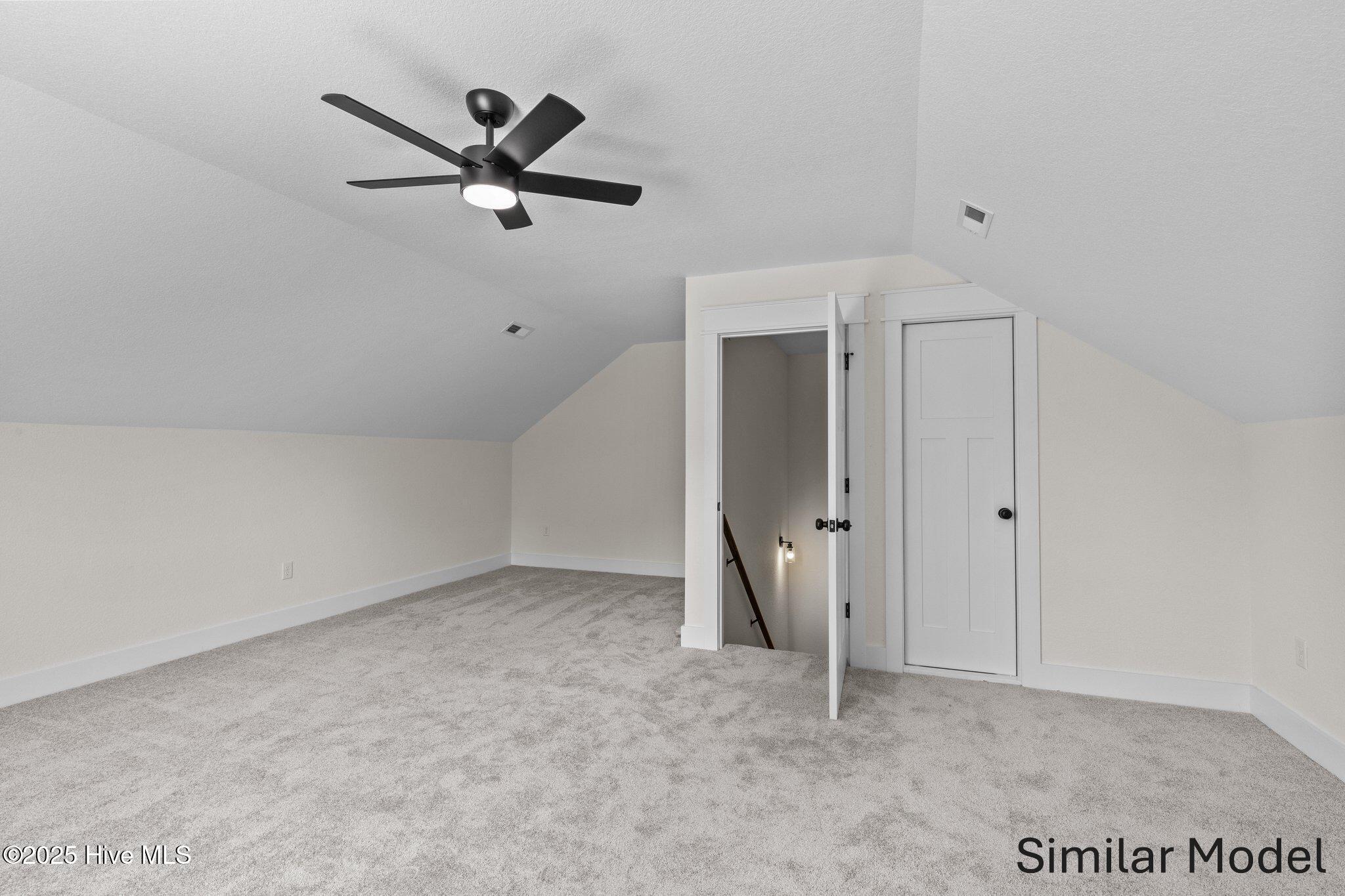 112 Howard Street Camden, NC 27921 - Photo 13 of 17 Finished room over the garage. similar model. colors might vary.