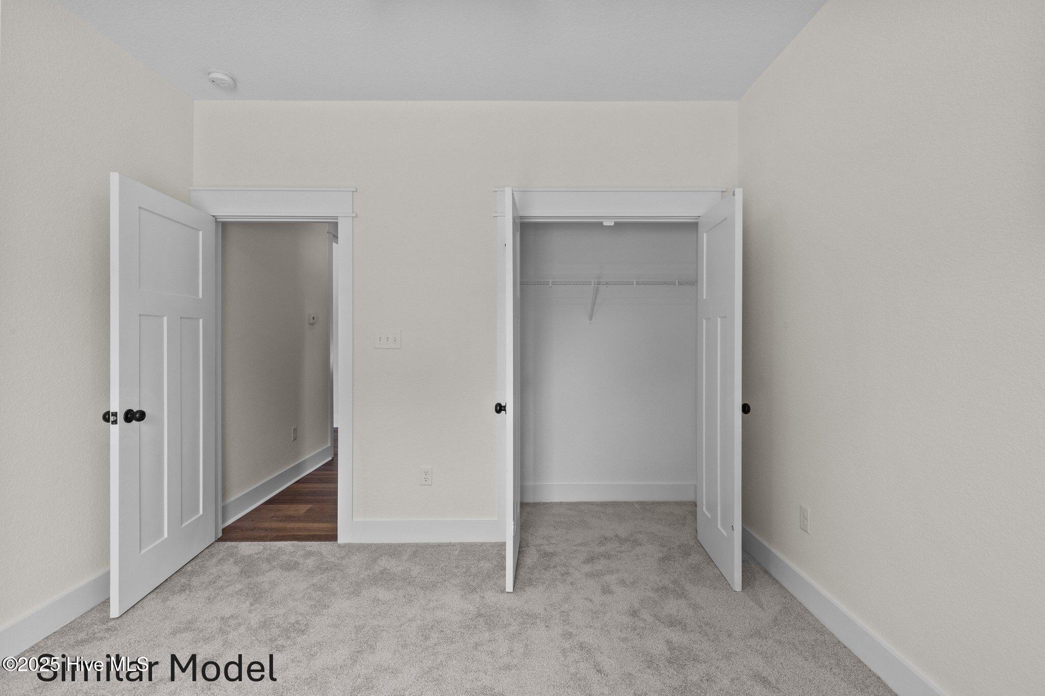 112 Howard Street Camden, NC 27921 - Photo 15 of 17 Second Bedroom. Similar model. Colors might vary.