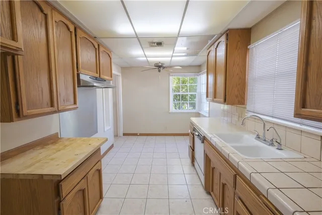 a bathroom with a sink a vanity and a mirror