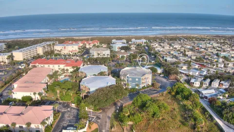 an aerial view of a city with lots of residential buildings