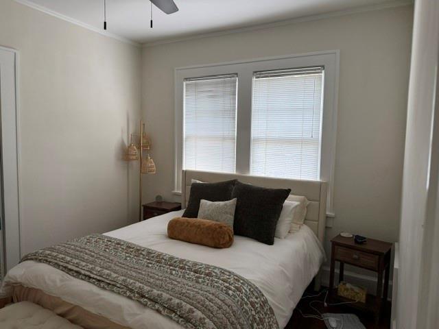 1365 North Highland Avenue Northeast, Unit B Atlanta, GA 30306 - Photo 8 of 11 a bedroom with a bed and window