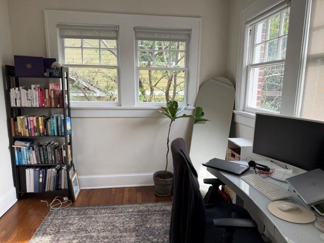 1365 North Highland Avenue Northeast, Unit B Atlanta, GA 30306 - Photo 10 of 11 a view of a workspace with furniture and a window