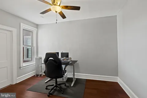 a view of a workspace with furniture