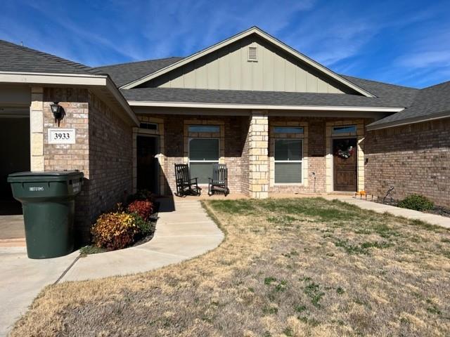 a front view of a house with patio