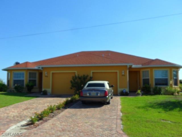 a car parked in front of a house