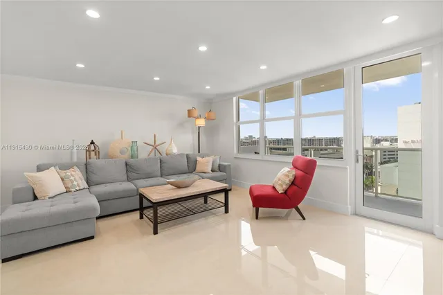 a living room with furniture and a table