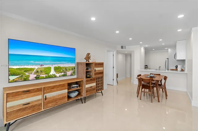 a bedroom with a bed and night stand