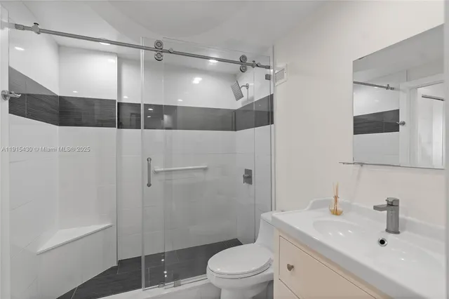 a kitchen with stainless steel appliances a refrigerator and a sink