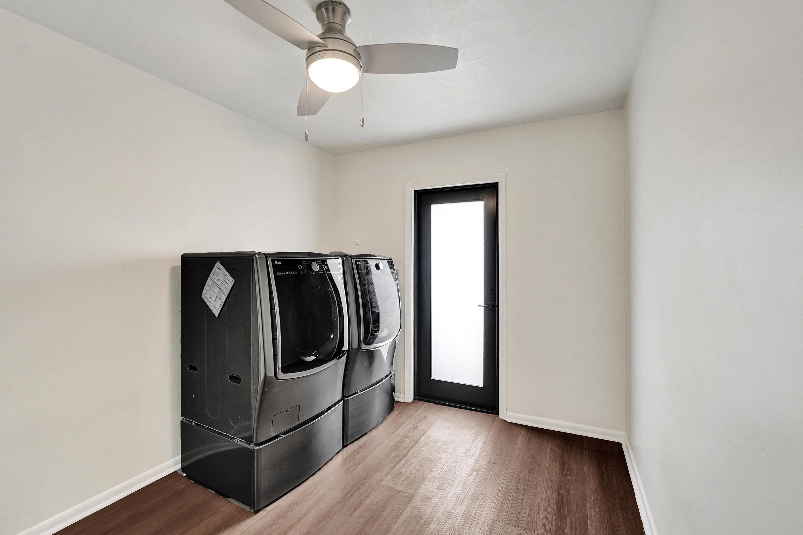 1321 Southwest 74th Terrace Plantation, FL 33317 - Photo 46 of 59 a view of a utility room with wooden floor