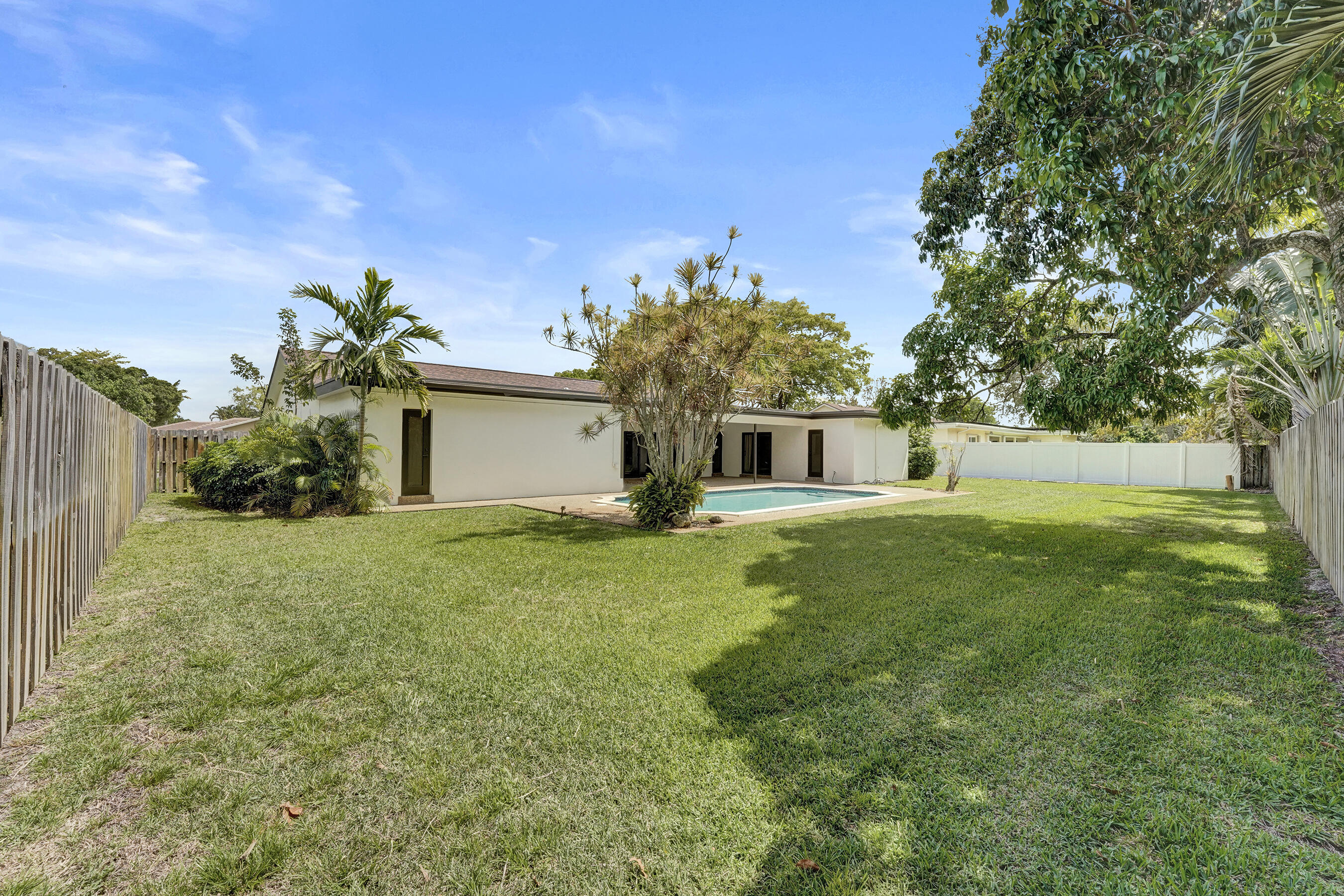 1321 Southwest 74th Terrace Plantation, FL 33317 - Photo 56 of 59 a house view with a garden space