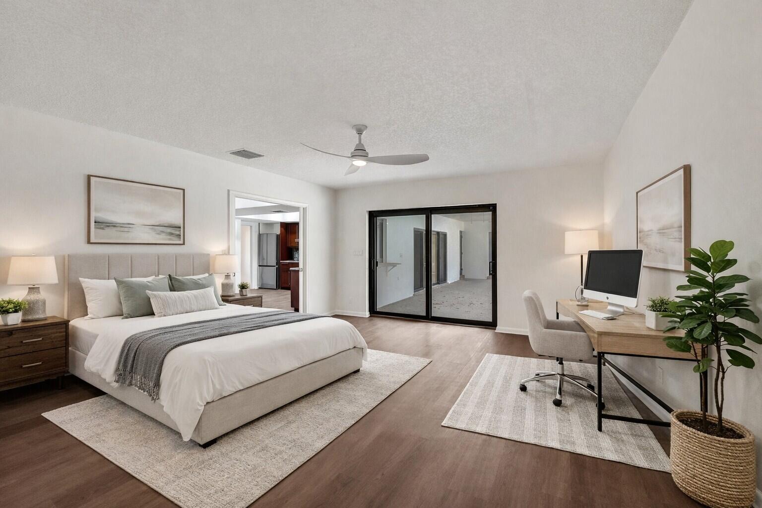 1321 Southwest 74th Terrace Plantation, FL 33317 - Photo 6 of 59 a bedroom with a bed and wooden floor