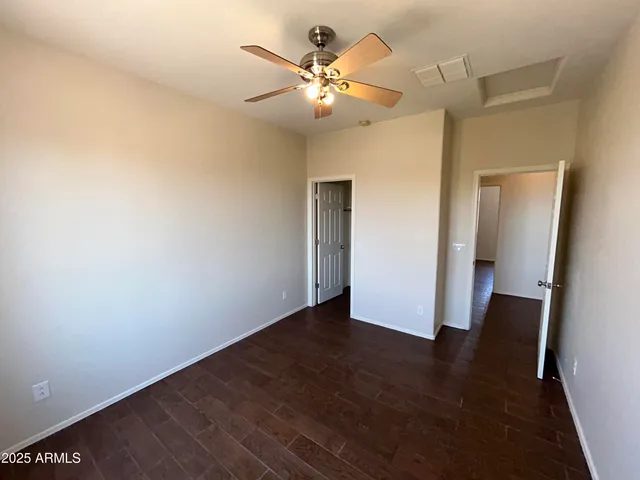 a bathroom with a sink a toilet a mirror and bathtub