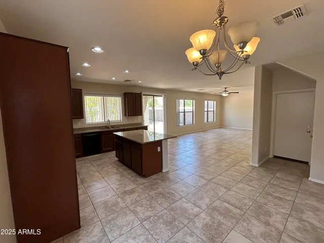 a view of a kitchen from the hall