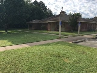500 Danville Road Kilgore, TX 75662 - Photo 11 of 22 a view of a house with a backyard