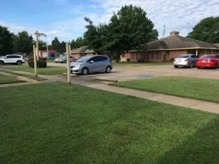 a car parked in front of a house