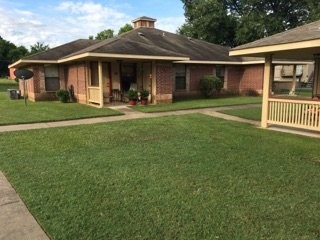 500 Danville Road Kilgore, TX 75662 - Photo 9 of 22 a front view of a house with garden