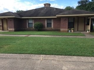 500 Danville Road Kilgore, TX 75662 - Photo 10 of 22 a front view of a house with a garden