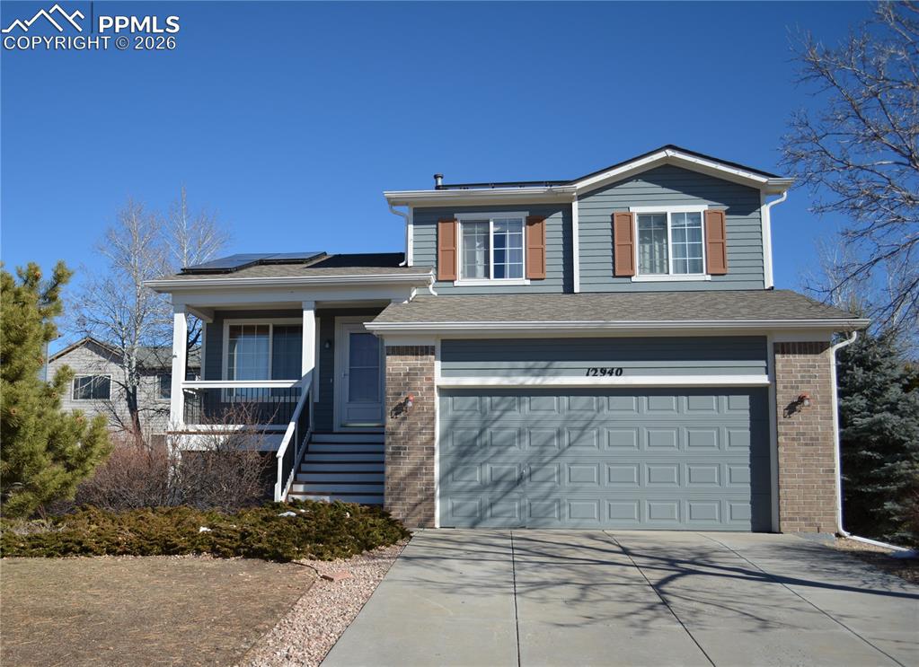 12940 Casa De Campo Road Peyton, CO 80831 - Photo 1 of 50 a front view of a house with garden