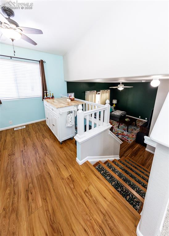 12940 Casa De Campo Road Peyton, CO 80831 - Photo 26 of 50 a living room with a bed furniture and a flat screen tv