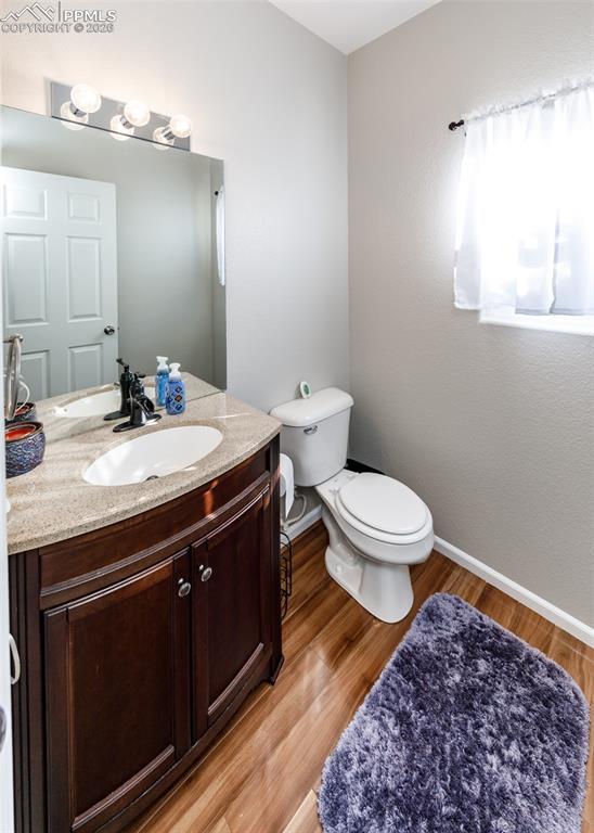 12940 Casa De Campo Road Peyton, CO 80831 - Photo 35 of 50 a bathroom with a sink and a toilet