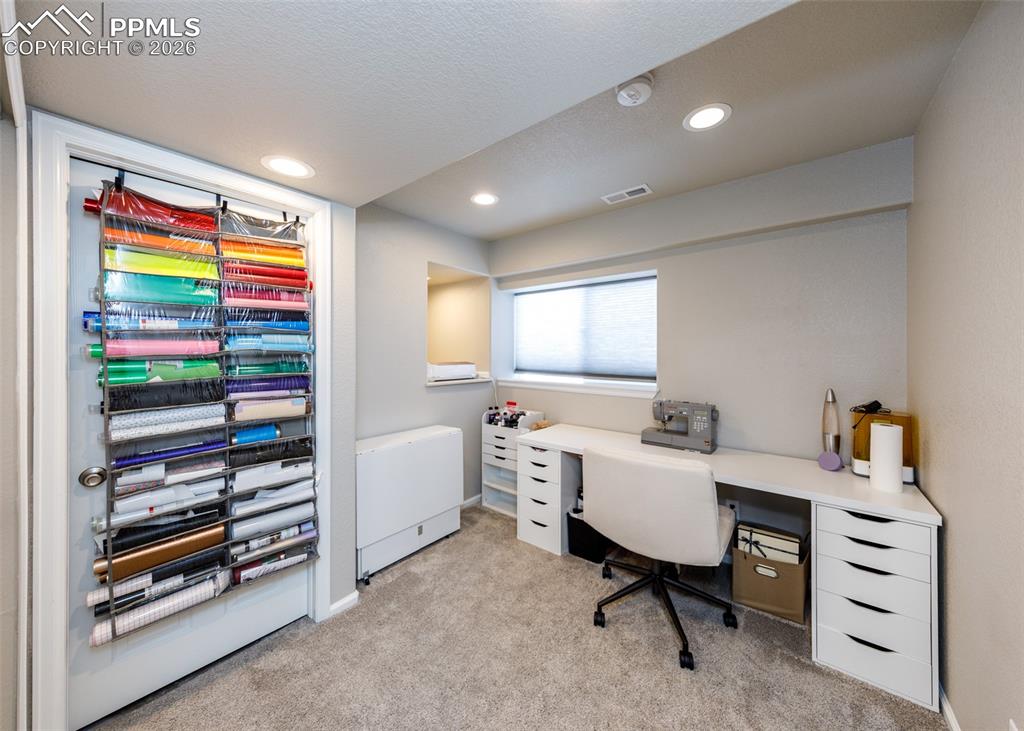 12940 Casa De Campo Road Peyton, CO 80831 - Photo 37 of 50 a workspace with furniture and window