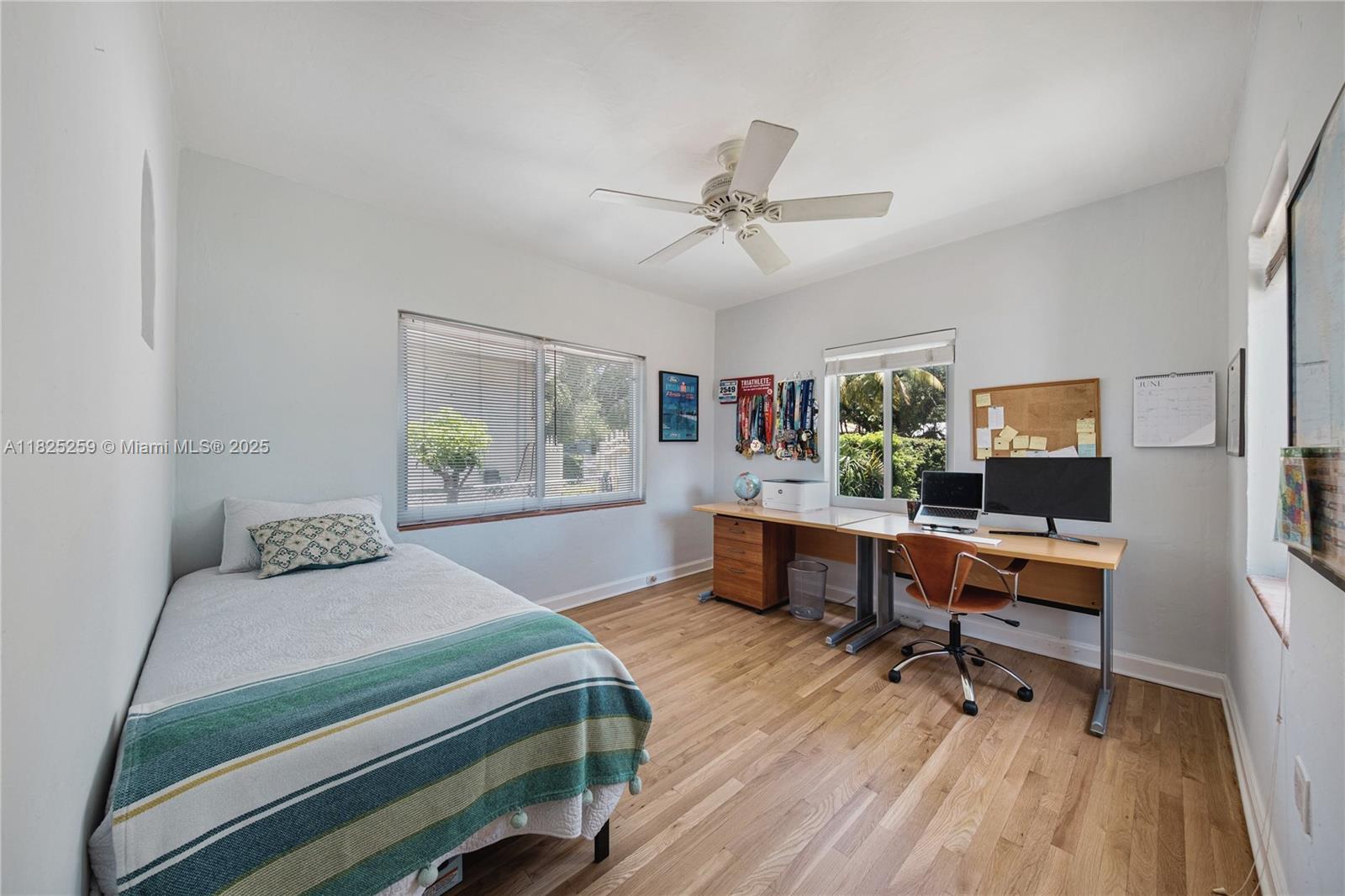 443 Southwest 18th Road Miami, FL 33129 - Photo 18 of 26 a bedroom with a workspace