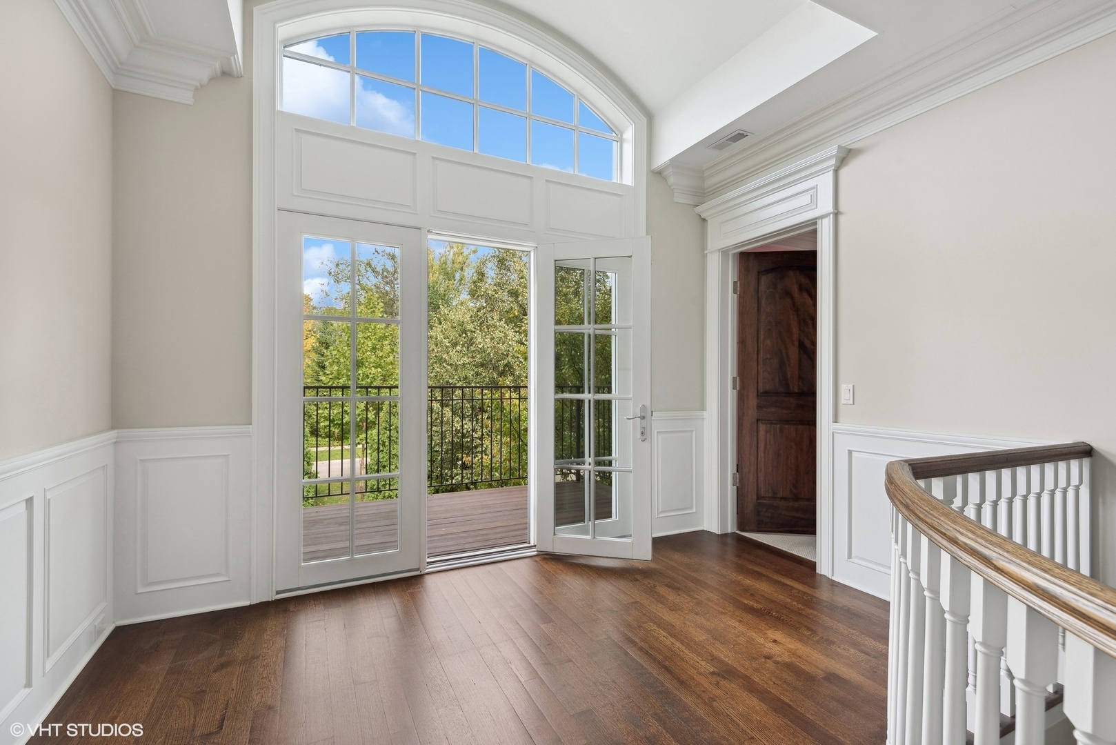1228 Westmoor Road Winnetka, IL 60093 - Photo 33 of 70 a view of an empty room with wooden floor and a window