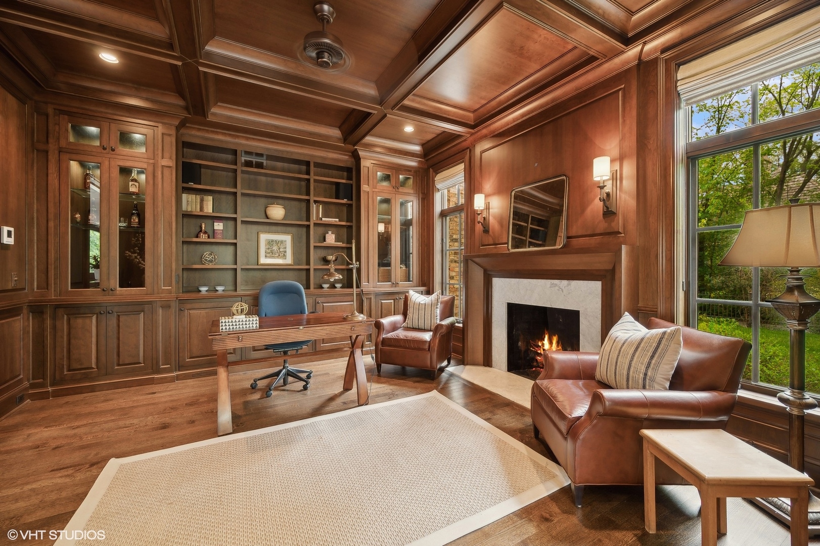 1228 Westmoor Road Winnetka, IL 60093 - Photo 10 of 70 a living room with furniture a fireplace and windows