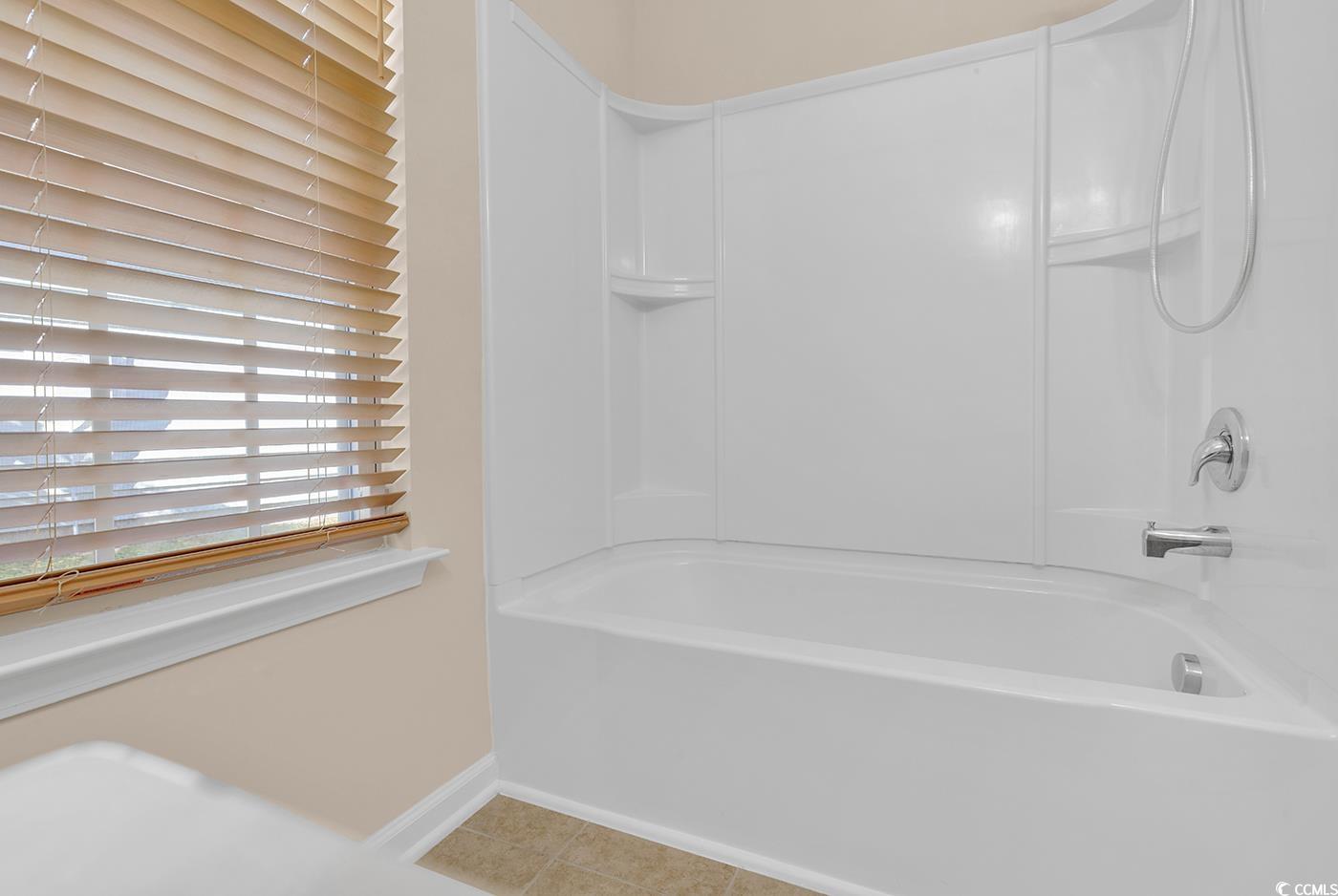 1612 Fairforest Court Conway, SC 29526 - Photo 29 of 40 Bathroom with shower / washtub combination and light tile patterned flooring
