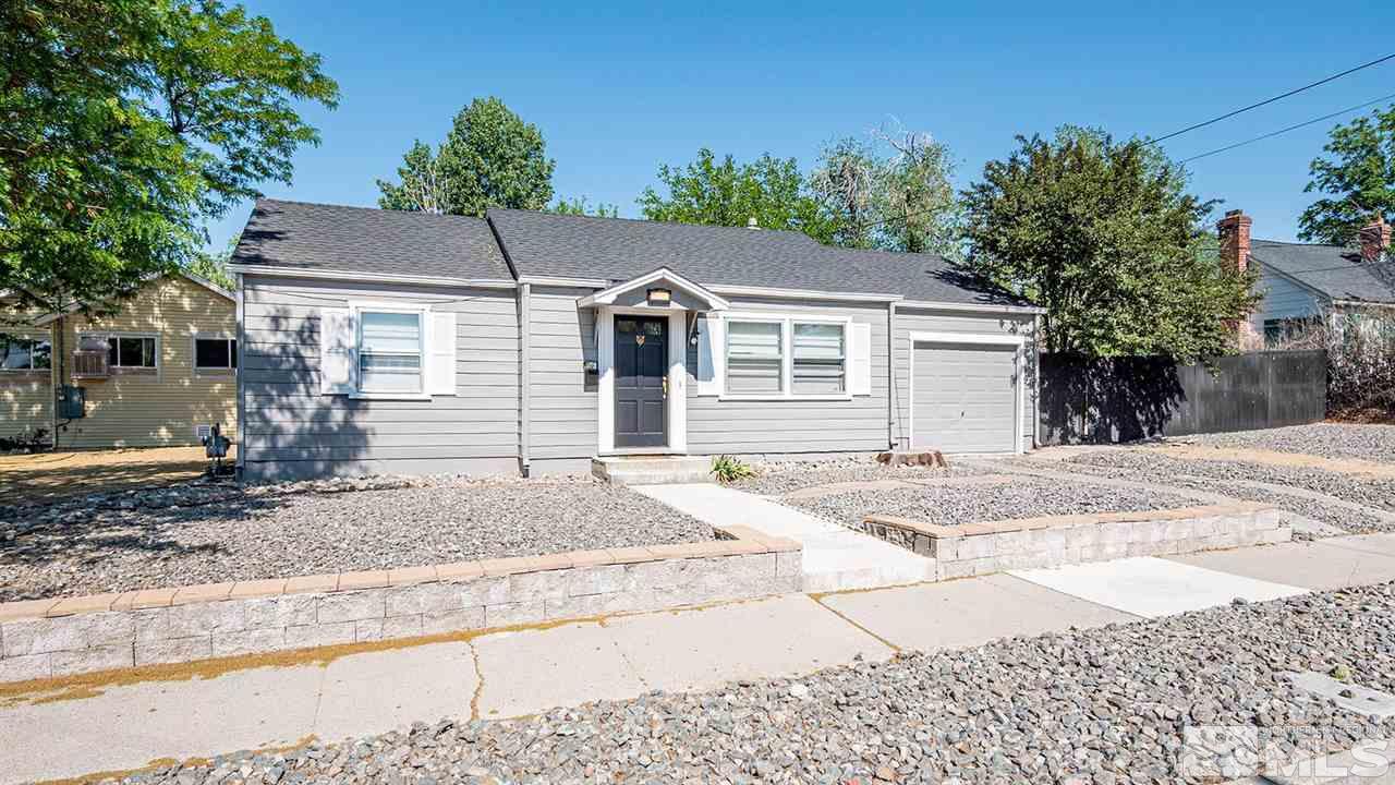 1201 Ralston Street Reno, NV 89503 - Photo 2 of 8 a front view of a house with a yard and trees