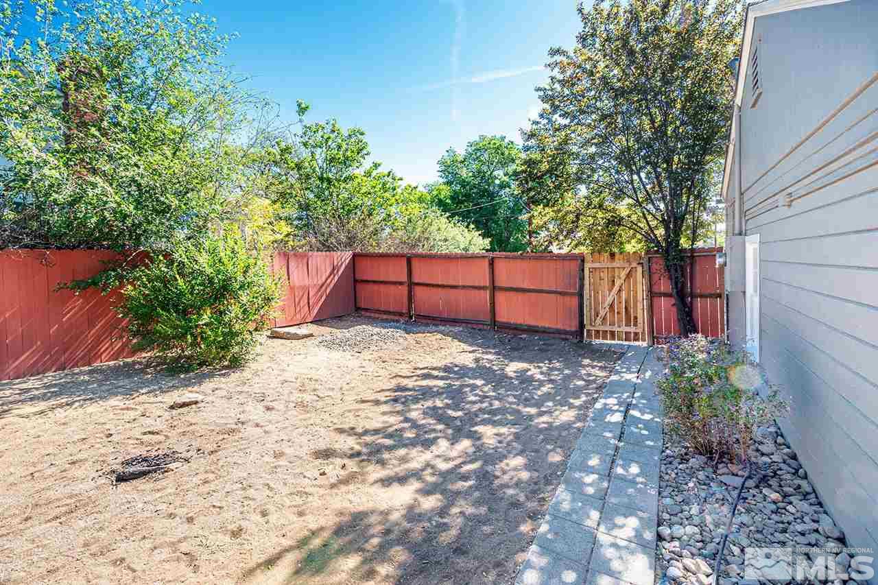 1201 Ralston Street Reno, NV 89503 - Photo 5 of 8 a wooden bench sitting in a yard