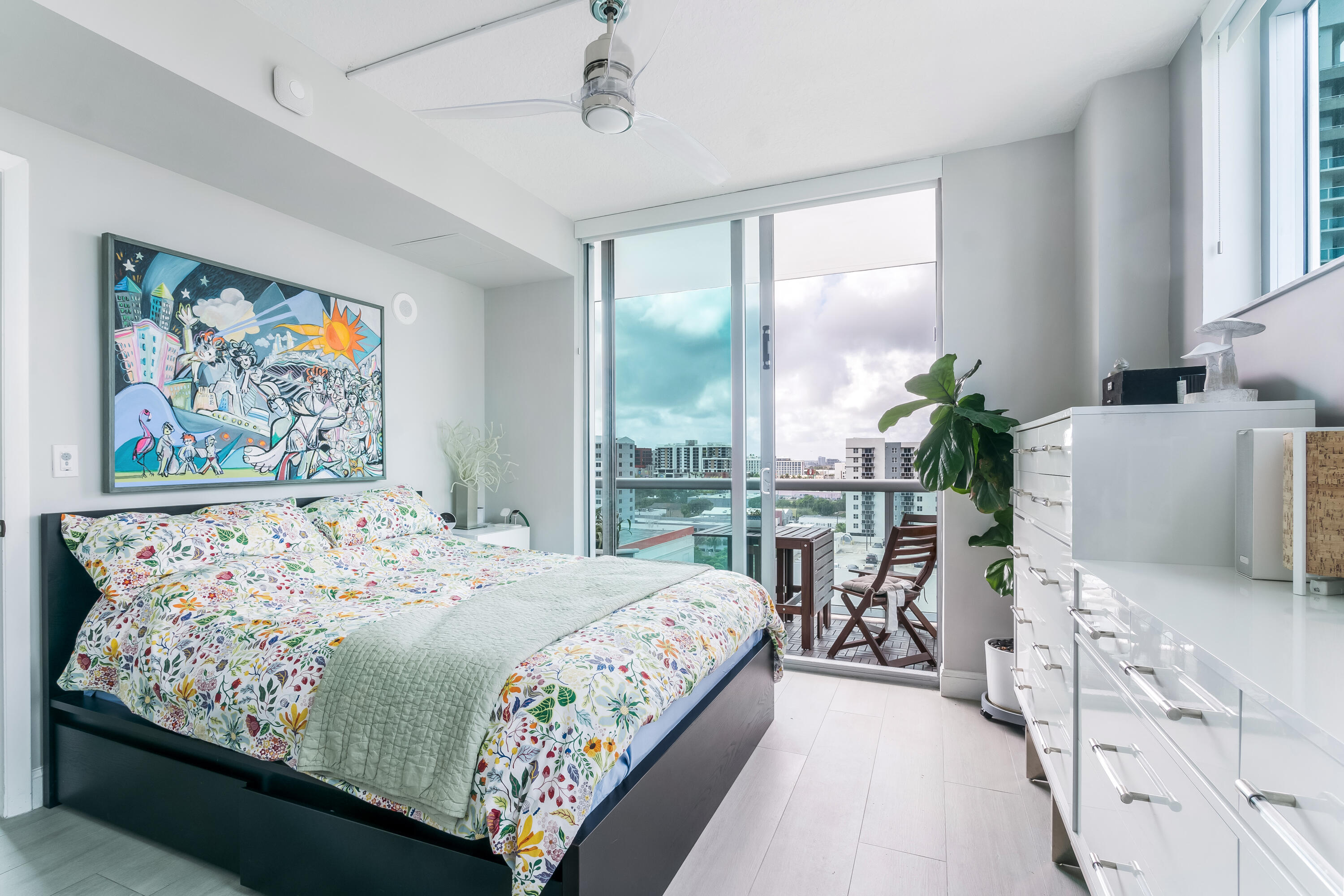 333 Northeast 24th Street, Unit 1102 Miami, FL 33137 - Photo 31 of 51 a bedroom with a large bed and a large window