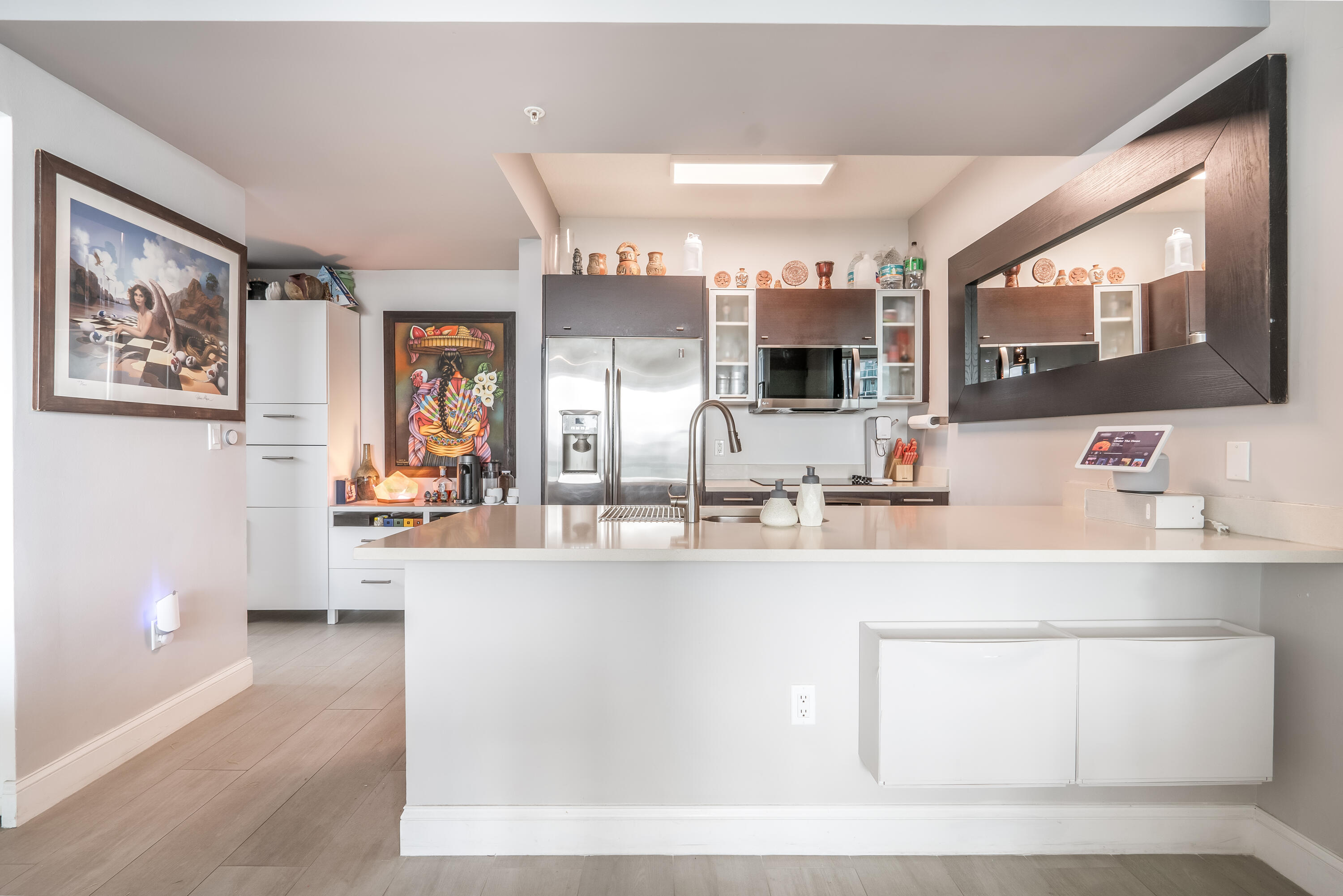 333 Northeast 24th Street, Unit 1102 Miami, FL 33137 - Photo 37 of 51 a living room with stainless steel appliances kitchen island granite countertop furniture and a large window