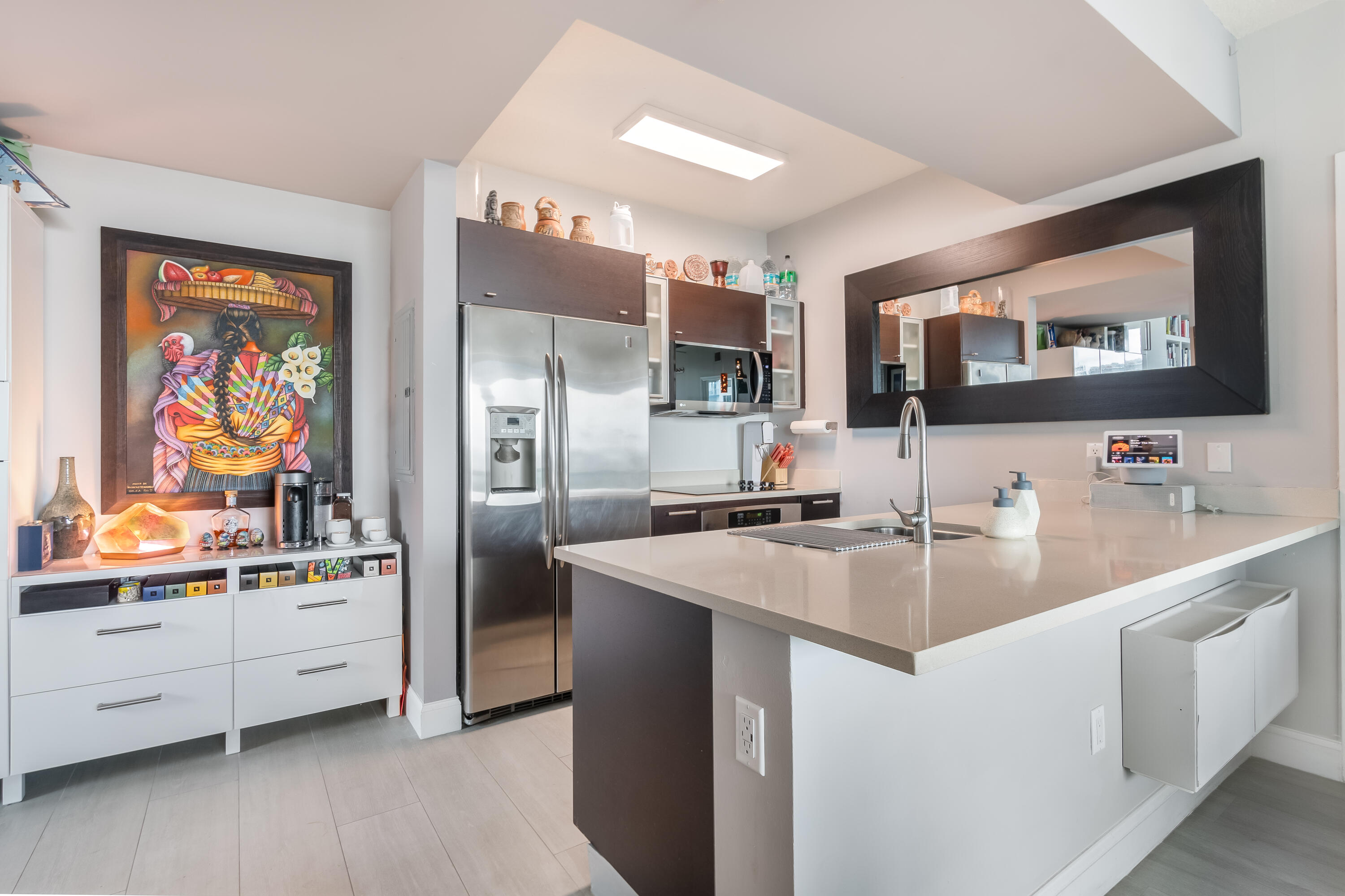 333 Northeast 24th Street, Unit 1102 Miami, FL 33137 - Photo 38 of 51 a kitchen with stainless steel appliances granite countertop a sink stove refrigerator and cabinets