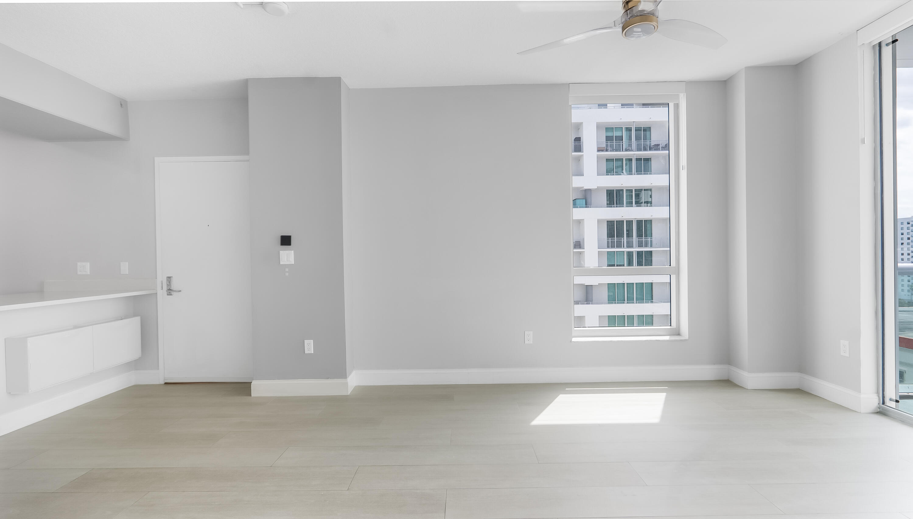 333 Northeast 24th Street, Unit 1102 Miami, FL 33137 - Photo 4 of 51 a view of an empty room with a window