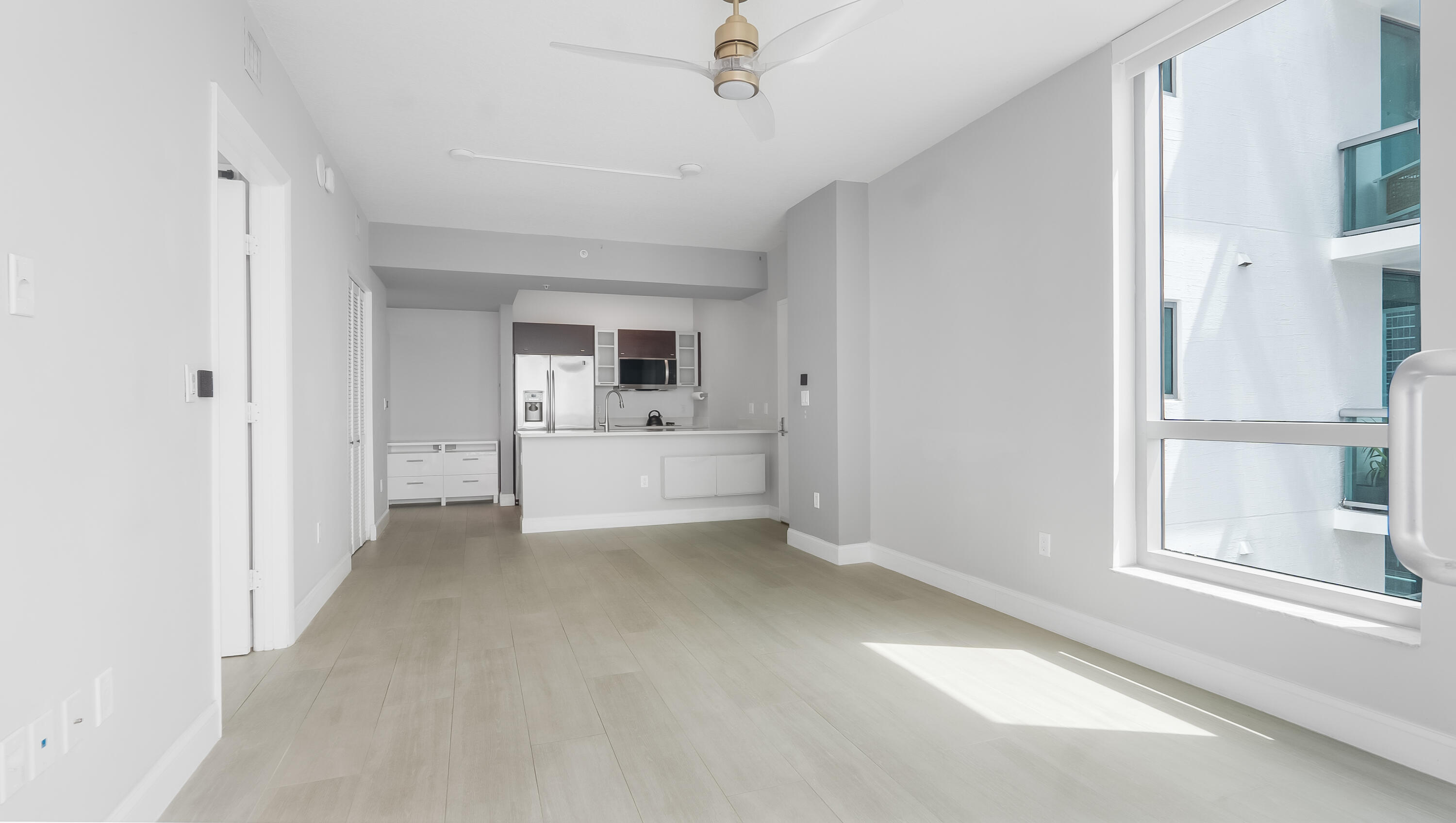 333 Northeast 24th Street, Unit 1102 Miami, FL 33137 - Photo 5 of 51 a view of livingroom with furniture and window