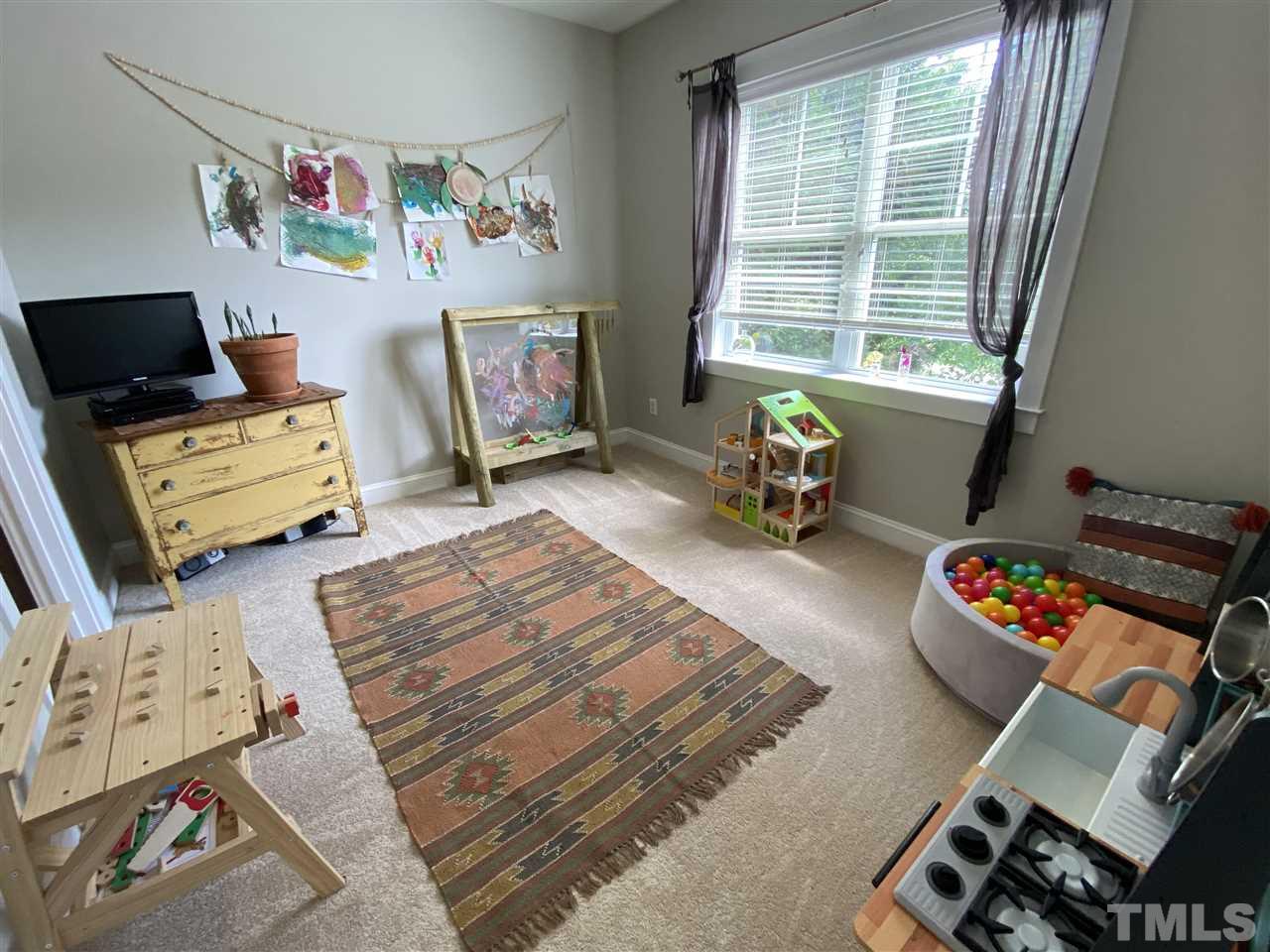 10701 Cokesbury Lane Raleigh, NC 27614 - Photo 19 of 24 Third Bedroom currently being used as a playroom.